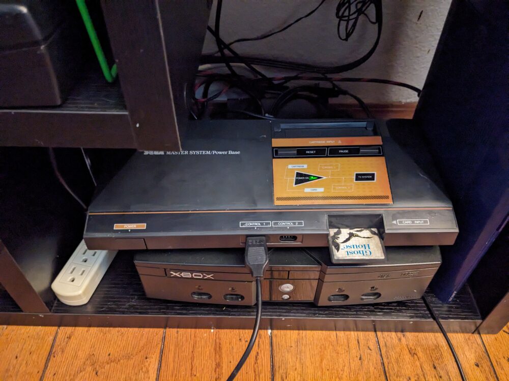 Redding van een Sega Master System uit een gesloopt huis