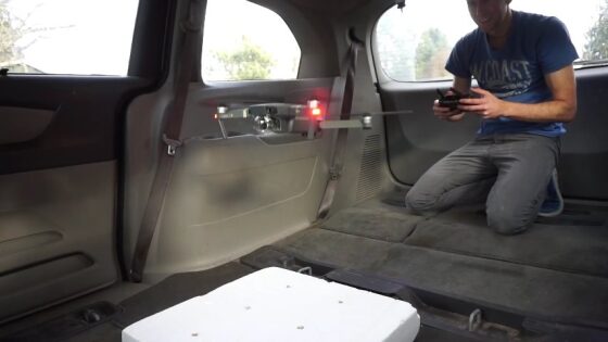 If a Drone Flies Inside a Car, Does It Move With the Vehicle or Collide With the Rear Window?